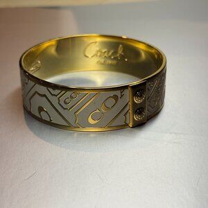 Coach Gold Logo Hinged Bangle Bracelet – Est. 1941
